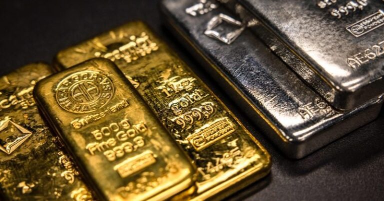 Silver tops $100 as gold nears $5,000 on extraordinary metals rally