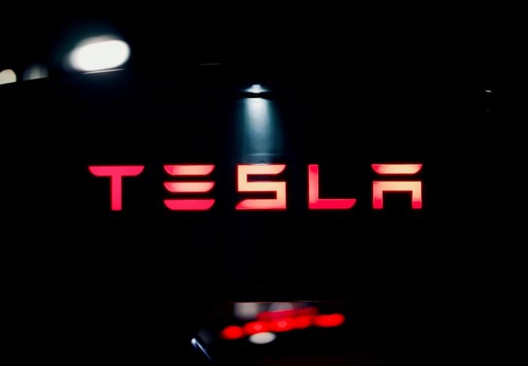 Tesla holds bitcoin steady, reports $112M impairment loss